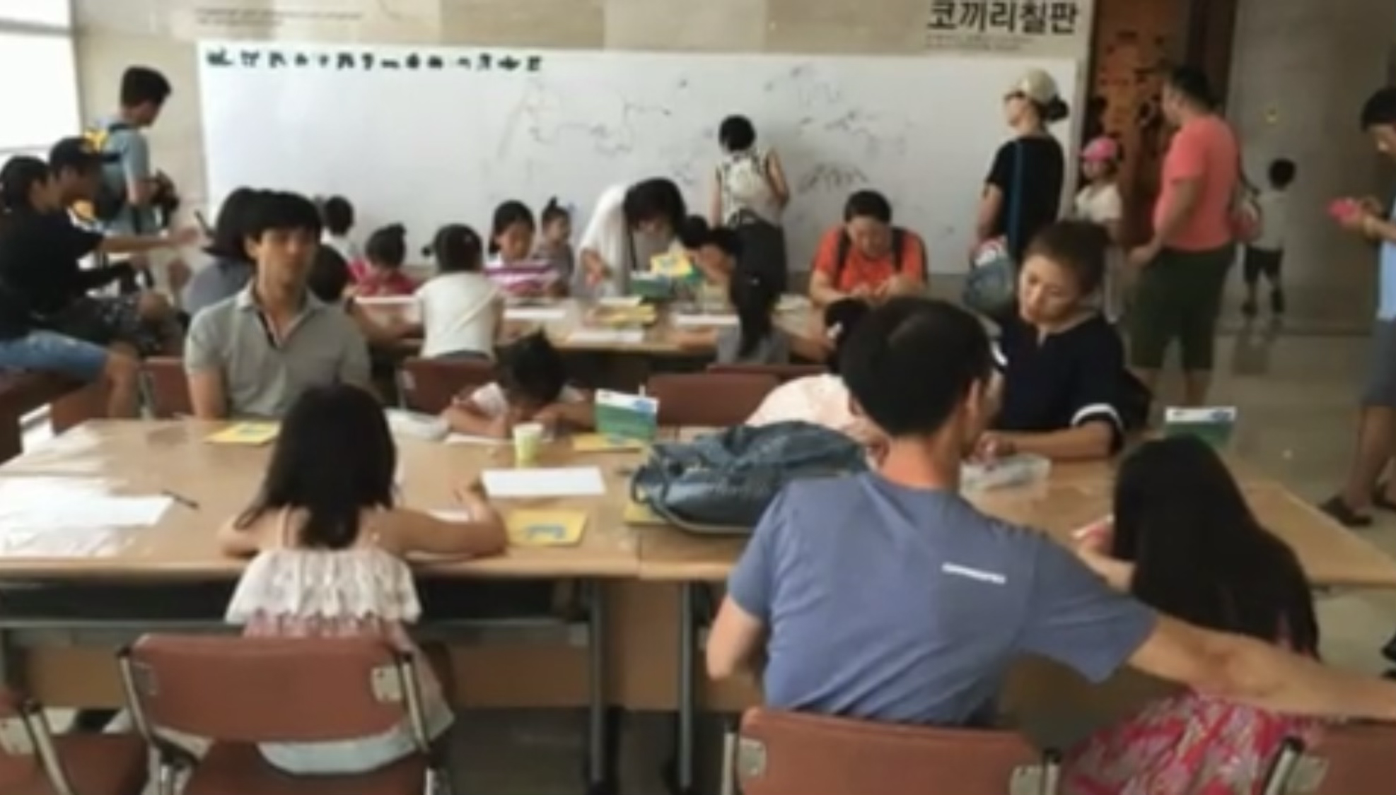 Families and children drawing together at Gyeongbuk Provincial Art Museum